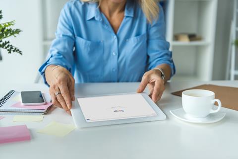 cropped-view-of-businesswoman-using-digital-tablet-2021-08-30-19-52-58-utc